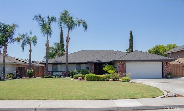 1301 Charterten Ave, Bakersfield, CA 93307 - ranch-style house featuring an attached garage, concrete driveway, and brick siding