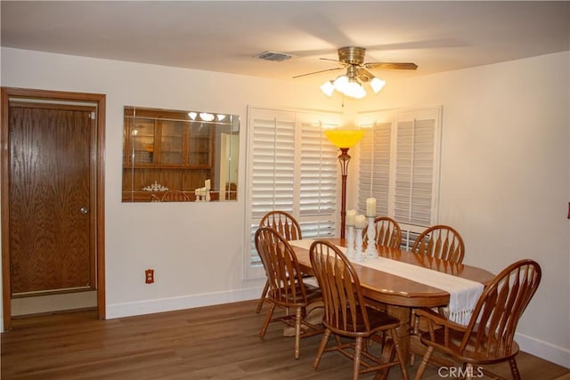 1301 Charterten Ave, Bakersfield, CA 93307 - dining room featuring ceiling fan, baseboards, and wood finished floors
