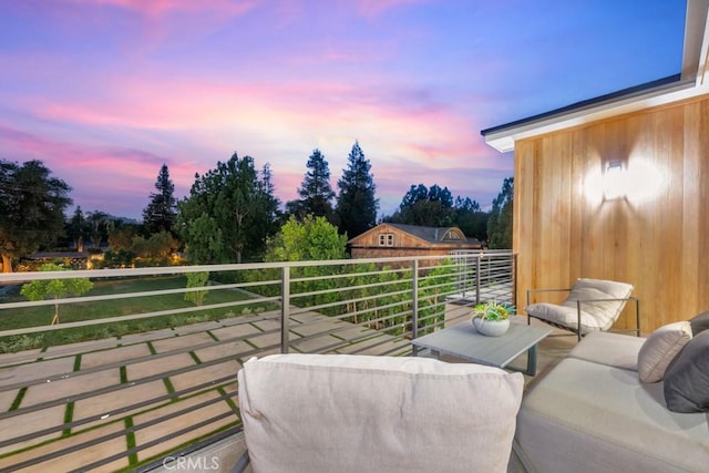 11835 Kling St, Valley Village, CA 91607 - balcony at dusk featuring an outdoor hangout area
