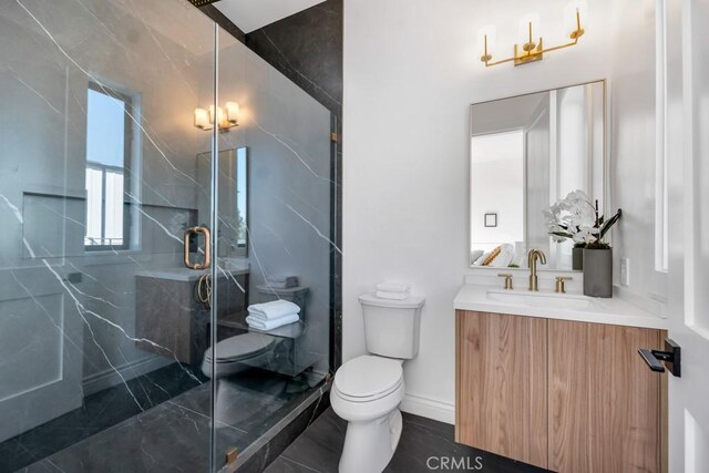11835 Kling St, Valley Village, CA 91607 - bathroom featuring toilet, vanity, and a marble finish shower