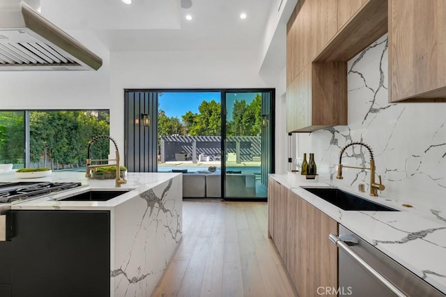 11835 Kling St, Valley Village, CA 91607 - kitchen featuring modern cabinets, exhaust hood, dishwasher, a sink, and recessed lighting