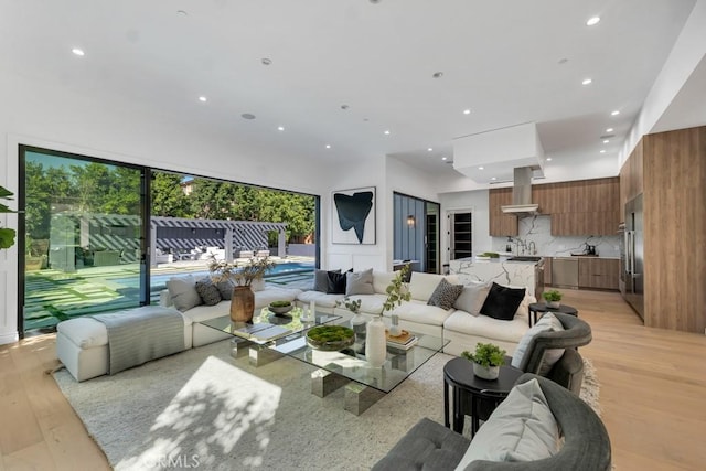 11835 Kling St, Valley Village, CA 91607 - living room with light wood-style flooring and recessed lighting