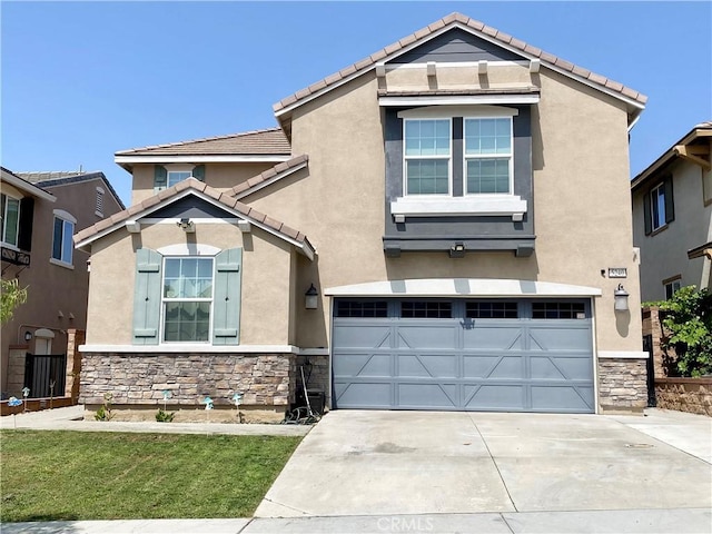 5240 Wintercress Ave, Fontana, CA 92336 - view of front facade featuring stone siding, driveway, an attached garage, and stucco siding
