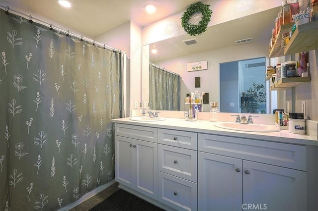 5240 Wintercress Ave, Fontana, CA 92336 - full bath featuring double vanity, recessed lighting, tile patterned flooring, and a shower with curtain