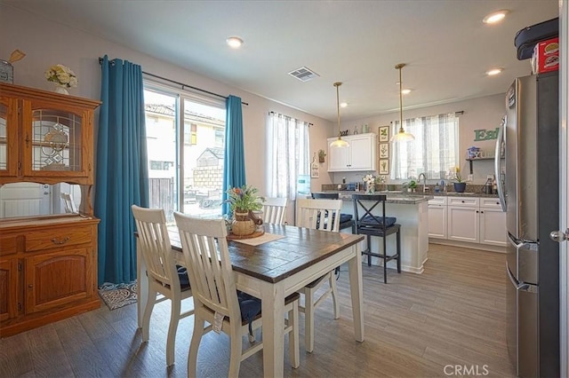 5240 Wintercress Ave, Fontana, CA 92336 - dining area with light wood-type flooring and recessed lighting