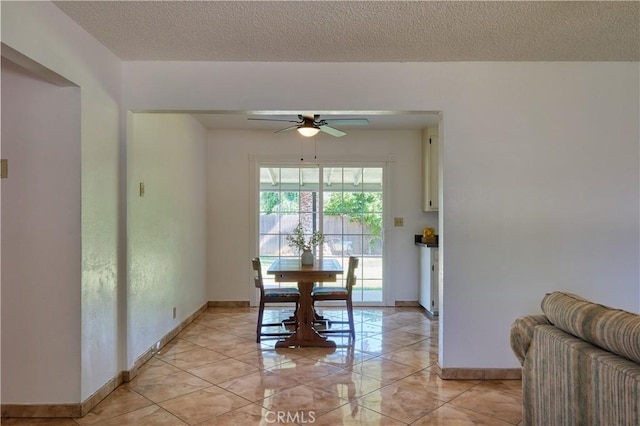 512 Maple St, Willows, CA 95988 - dining room with a ceiling fan, baseboards, and a textured ceiling