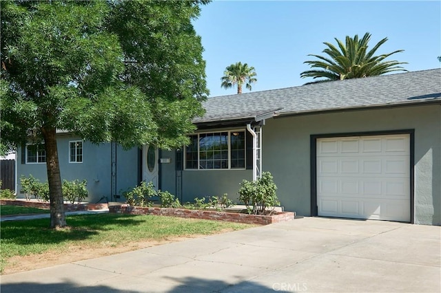 512 Maple St, Willows, CA 95988 - single story home featuring a garage, stucco siding, driveway, and a shingled roof