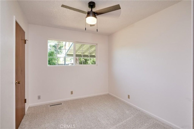 512 Maple St, Willows, CA 95988 - carpeted spare room with a ceiling fan, baseboards, and a textured ceiling