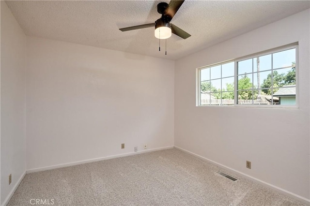 512 Maple St, Willows, CA 95988 - unfurnished room featuring a textured ceiling, carpet floors, a ceiling fan, and baseboards