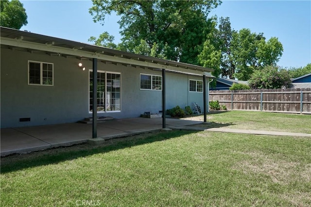 512 Maple St, Willows, CA 95988 - rear view of property featuring a patio, stucco siding, and crawl space