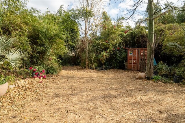 160 E Franklin Ave, Pomona, CA 91766 - view of yard with view of wooded area