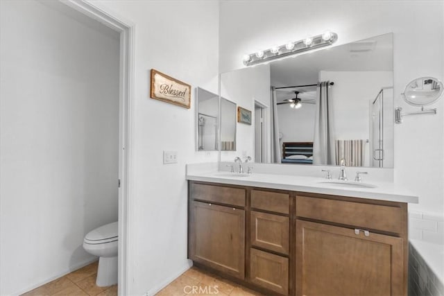 1331 Nicholas Ct, Rialto, CA 92377 - full bathroom with ceiling fan, double vanity, toilet, a shower with door, and a bath