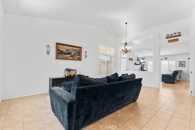 1331 Nicholas Ct, Rialto, CA 92377 - living area with light tile patterned floors, vaulted ceiling, and a chandelier