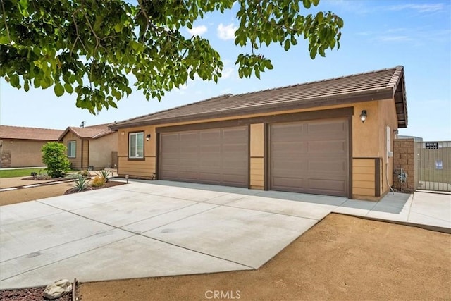 1331 Nicholas Ct, Rialto, CA 92377 - ranch-style house with stucco siding, a gate, and a tile roof
