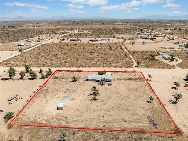 13044 Smith Rd, Phelan, CA 92371 - overview of rural landscape featuring a desert landscape, property parcel outlined, and a mountain backdrop