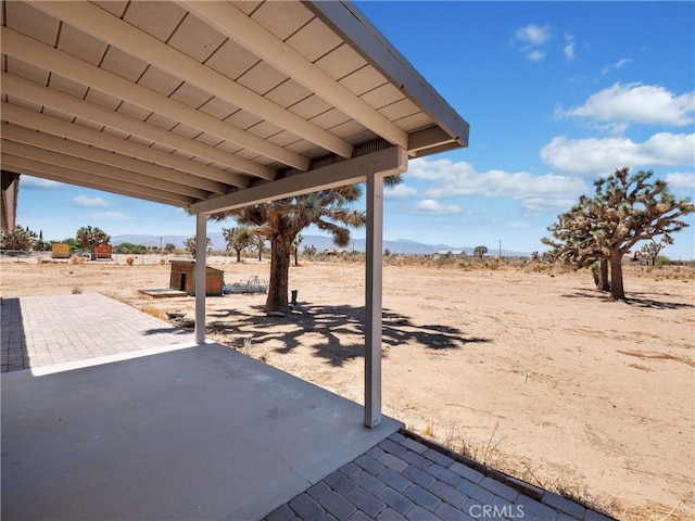 13044 Smith Rd, Phelan, CA 92371 - view of yard featuring a patio area and a mountain view