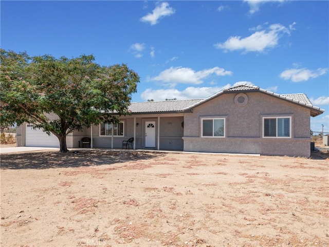 13044 Smith Rd, Phelan, CA 92371 - view of front facade with a tiled roof and stucco siding