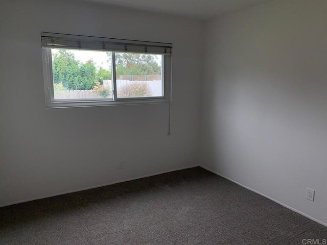 3465 Spanish Way, Carlsbad, CA 92008 - unfurnished room with dark carpet and baseboards