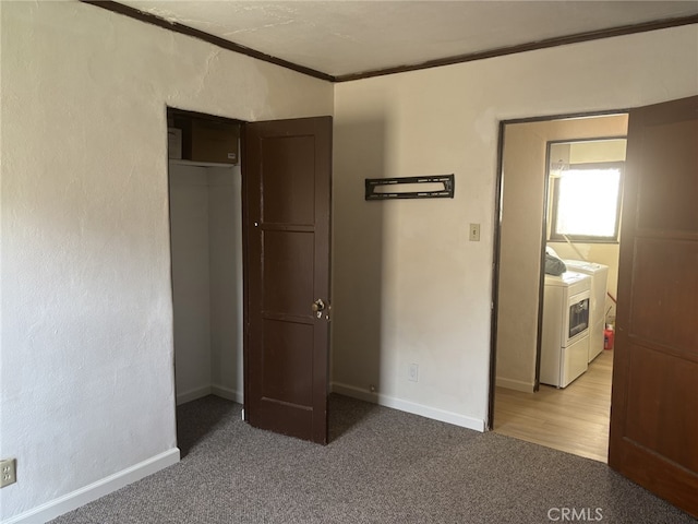 919 Dexter St, Los Angeles, CA 90042 - unfurnished bedroom featuring washer and clothes dryer, ornamental molding, carpet floors, and baseboards