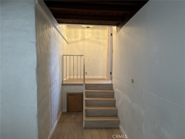 919 Dexter St, Los Angeles, CA 90042 - staircase featuring wood finished floors, baseboards, and beamed ceiling