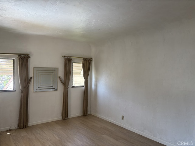 919 Dexter St, Los Angeles, CA 90042 - unfurnished room with light wood-style floors and baseboards