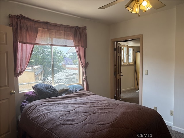 919 Dexter St, Los Angeles, CA 90042 - carpeted bedroom with baseboards and a ceiling fan
