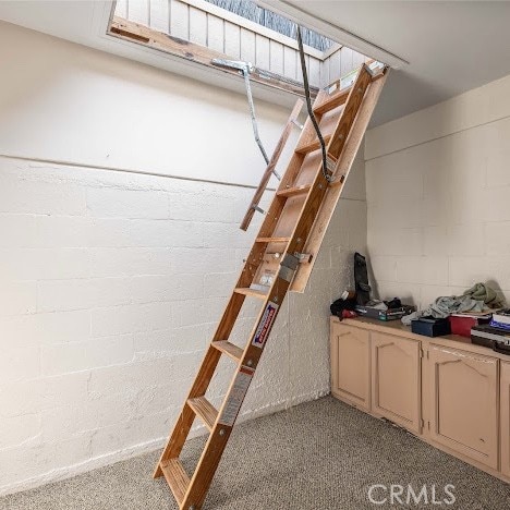 919 Dexter St, Los Angeles, CA 90042 - stairs with carpet flooring and concrete block wall