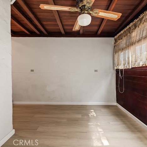 919 Dexter St, Los Angeles, CA 90042 - empty room with wooden ceiling, wood finished floors, and ceiling fan