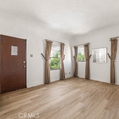 919 Dexter St, Los Angeles, CA 90042 - foyer entrance with light wood finished floors