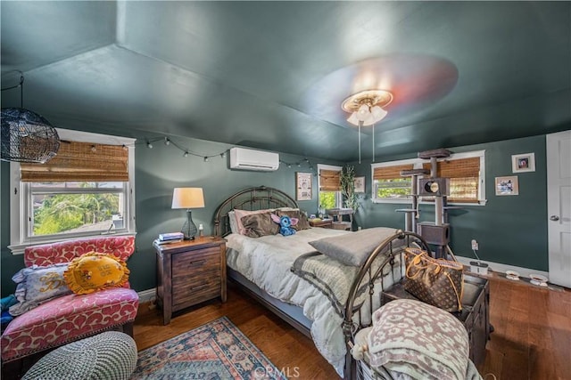 536 W Palm Dr, Arcadia, CA 91007 - bedroom featuring a wall unit AC, wood finished floors, and baseboards