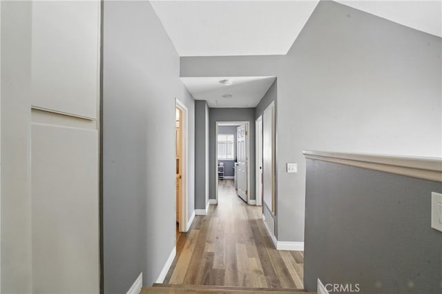 140 W 220th St Unit 105, Carson, CA 90745 - hallway featuring wood finished floors and baseboards
