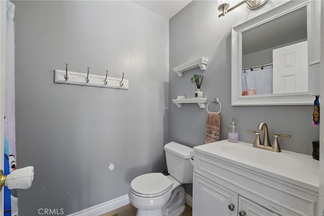 140 W 220th St Unit 105, Carson, CA 90745 - full bath with toilet, vanity, and baseboards