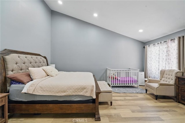 140 W 220th St Unit 105, Carson, CA 90745 - bedroom featuring lofted ceiling, light wood-style flooring, and recessed lighting
