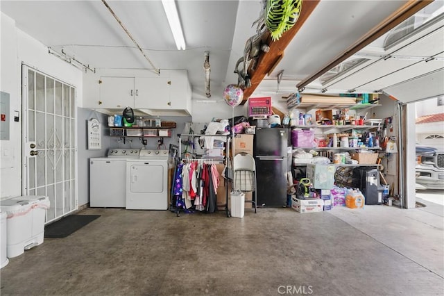 140 W 220th St Unit 105, Carson, CA 90745 - garage with washing machine and clothes dryer and freestanding refrigerator