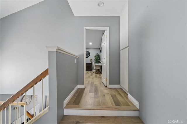 140 W 220th St Unit 105, Carson, CA 90745 - hallway featuring wood finished floors, recessed lighting, and stairs