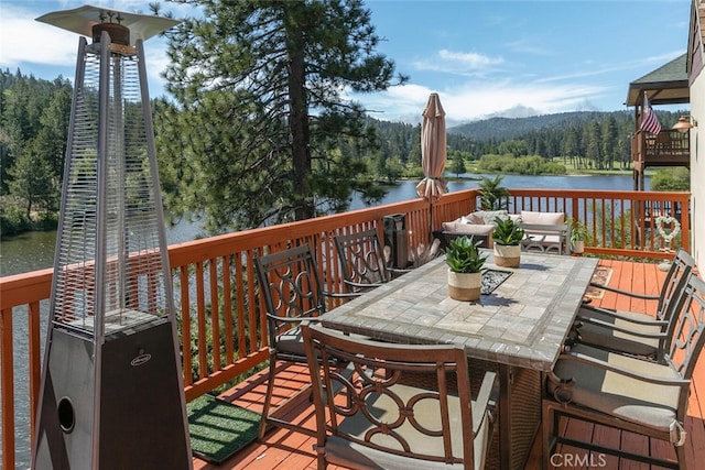 781 Brentwood Dr, Lake Arrowhead, CA 92352 - wooden deck with a water view, a wooded view, and outdoor dining area