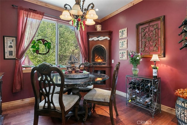 781 Brentwood Dr, Lake Arrowhead, CA 92352 - dining space featuring a chandelier, ornamental molding, and wood finished floors