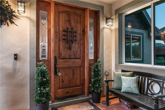 781 Brentwood Dr, Lake Arrowhead, CA 92352 - view of exterior entry with covered porch and stucco siding
