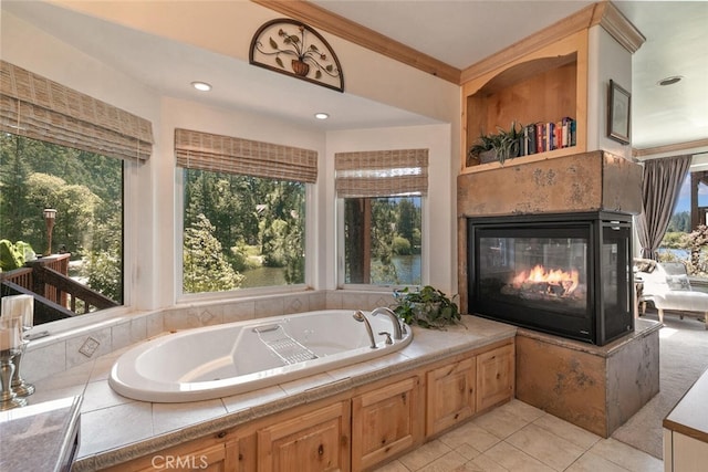 781 Brentwood Dr, Lake Arrowhead, CA 92352 - bathroom with a multi sided fireplace, a tub with jets, and tile patterned floors