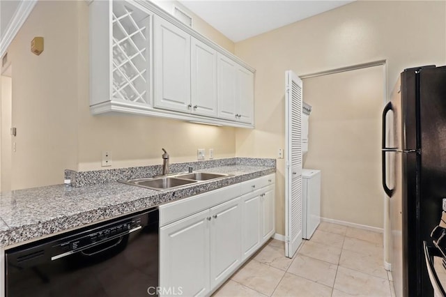 3125 Watermarke Pl, Irvine, CA 92612 - kitchen featuring freestanding refrigerator, black dishwasher, a sink, tile countertops, and white cabinetry