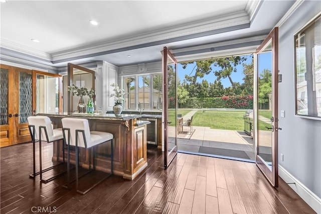 443 W Longden Ave, Arcadia, CA 91007 - bar area featuring crown molding, dark wood-type flooring, french doors, wine cooler, and baseboards