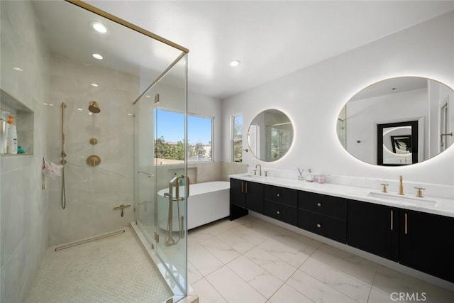 1941 Devaul Ranch Dr, San Luis Obispo, CA 93405 - bathroom with a freestanding tub, double vanity, marble finish floors, a stall shower, and recessed lighting