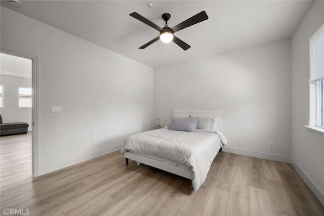 1941 Devaul Ranch Dr, San Luis Obispo, CA 93405 - bedroom with wood finished floors, multiple windows, baseboards, and a ceiling fan