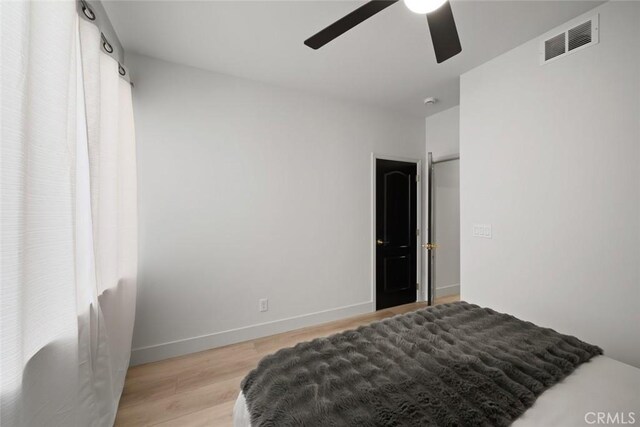 1941 Devaul Ranch Dr, San Luis Obispo, CA 93405 - bedroom with wood finished floors, baseboards, and a ceiling fan