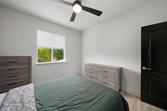 1941 Devaul Ranch Dr, San Luis Obispo, CA 93405 - bedroom with light wood finished floors, baseboards, and a ceiling fan