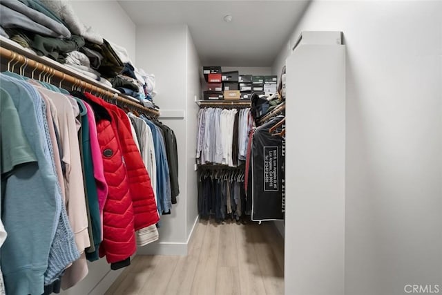 1941 Devaul Ranch Dr, San Luis Obispo, CA 93405 - walk in closet with wood finished floors