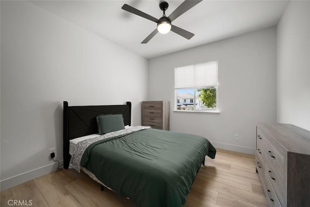 1941 Devaul Ranch Dr, San Luis Obispo, CA 93405 - bedroom with light wood finished floors, baseboards, and a ceiling fan