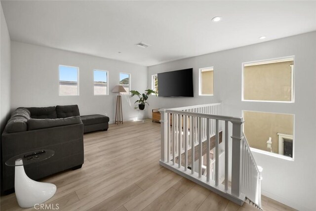 1941 Devaul Ranch Dr, San Luis Obispo, CA 93405 - living area featuring wood finished floors, recessed lighting, and baseboards