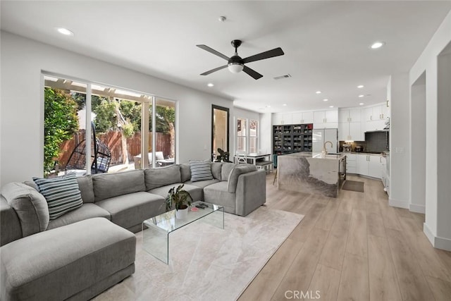 1941 Devaul Ranch Dr, San Luis Obispo, CA 93405 - living area with plenty of natural light, a ceiling fan, recessed lighting, and light wood-type flooring