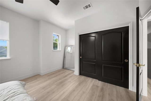 1941 Devaul Ranch Dr, San Luis Obispo, CA 93405 - unfurnished bedroom with light wood-style floors, baseboards, and ceiling fan